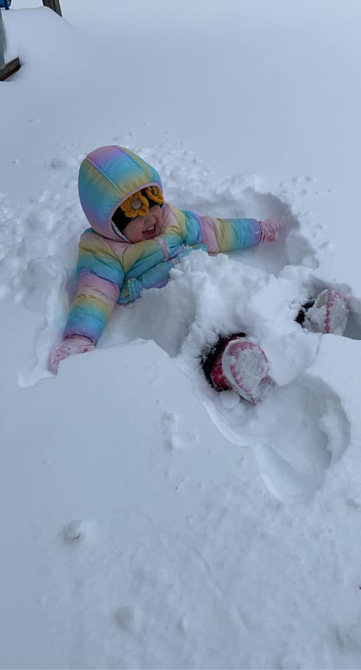 Throwing daughter in snow